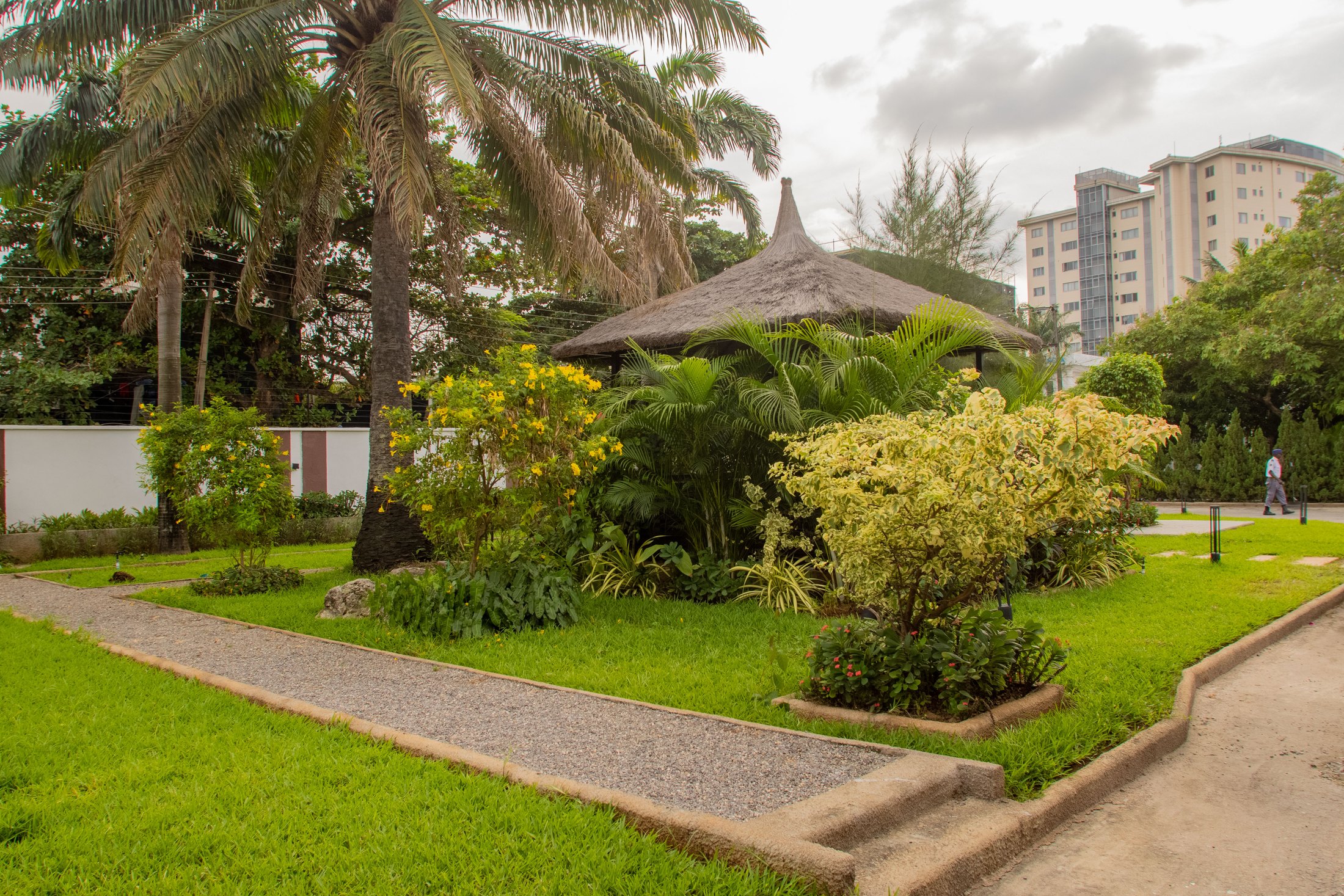 Garden courtyard with lawns and tropical planting